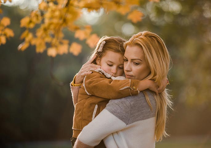 A mother and daughter feeling down